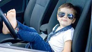 What age can a child sit in the front seat in Queensland